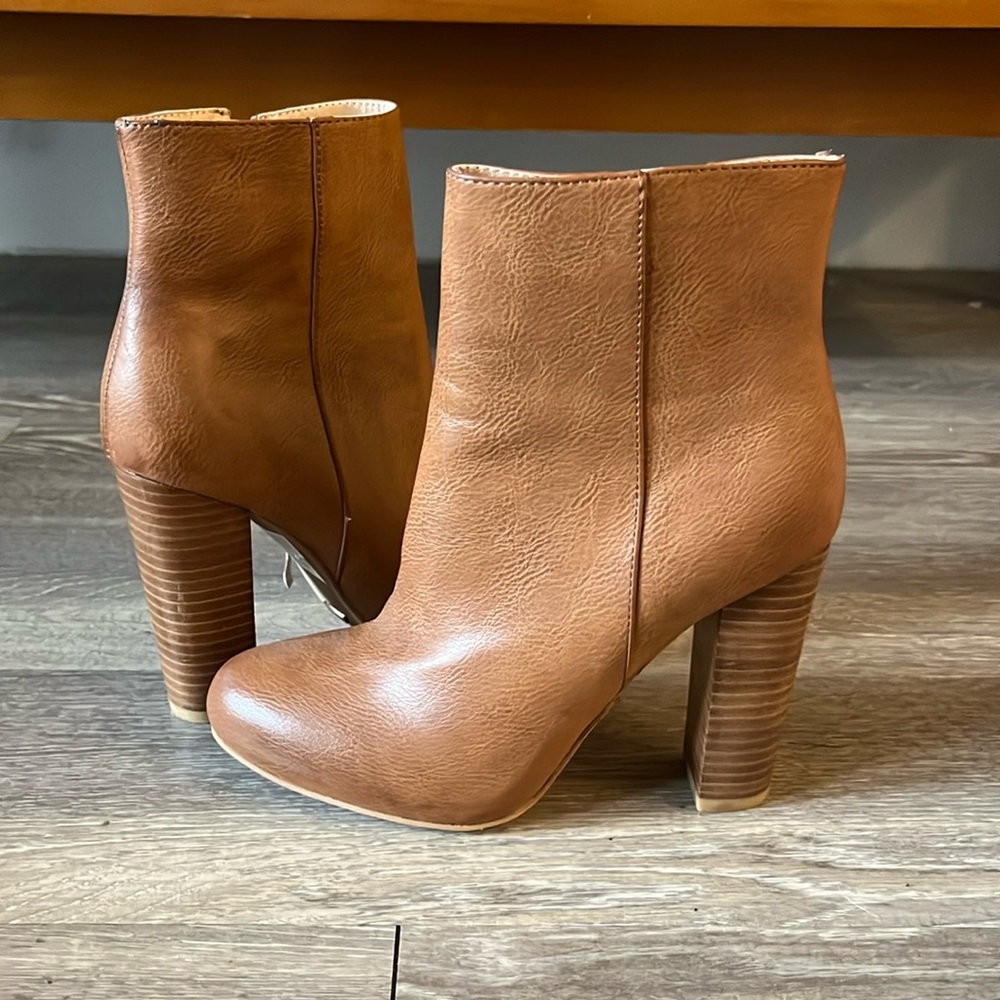 Lightly worn brown leather booties